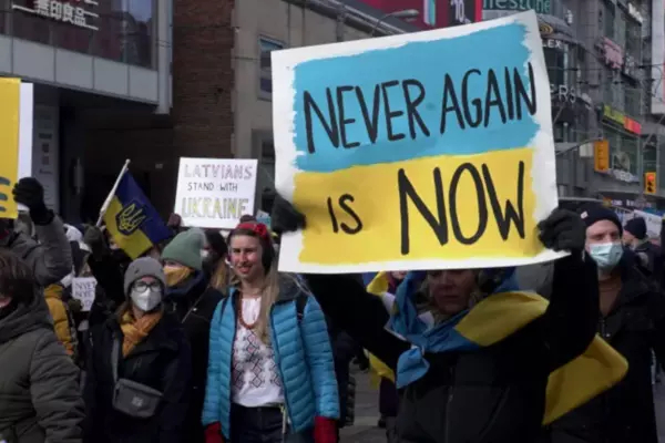 In February, thousands of people marched in downtown Toronto to denounce the Russian invasion of Ukraine. (Grant Linton/CBC)