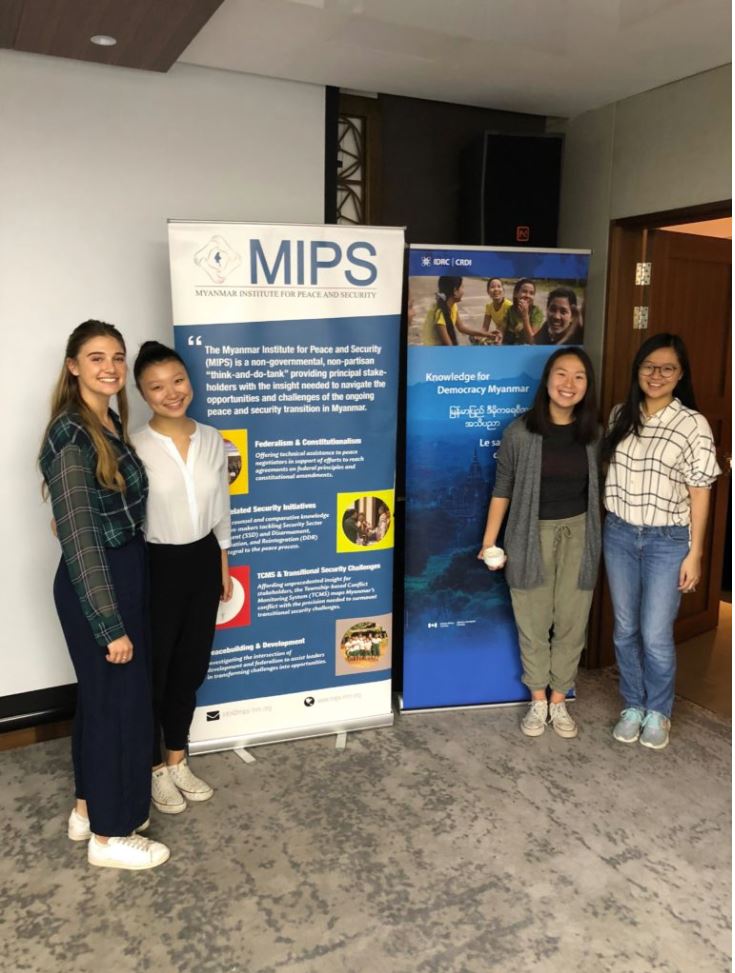 CAS students in Yangon, Myanmar pose with MIPS banner.