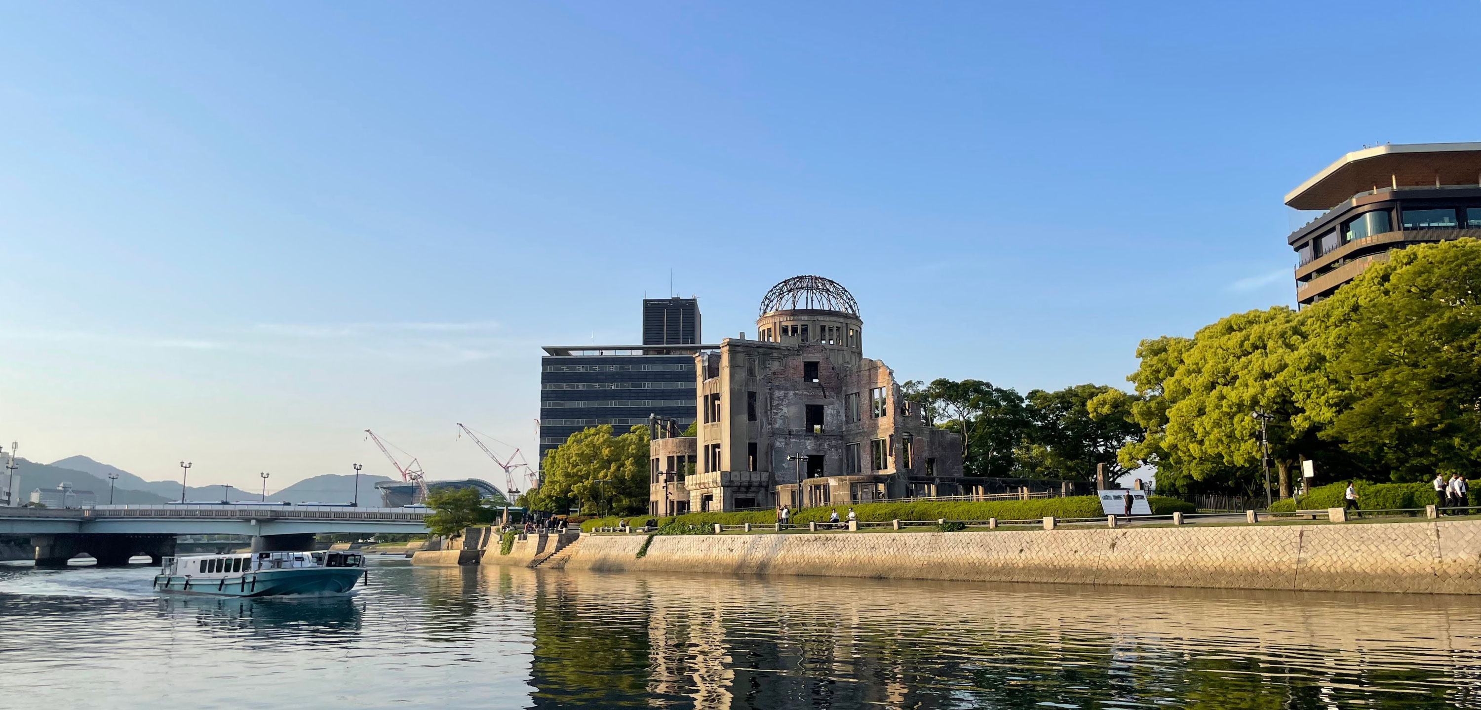 Hiroshima Peace Memorial park photographer across a river