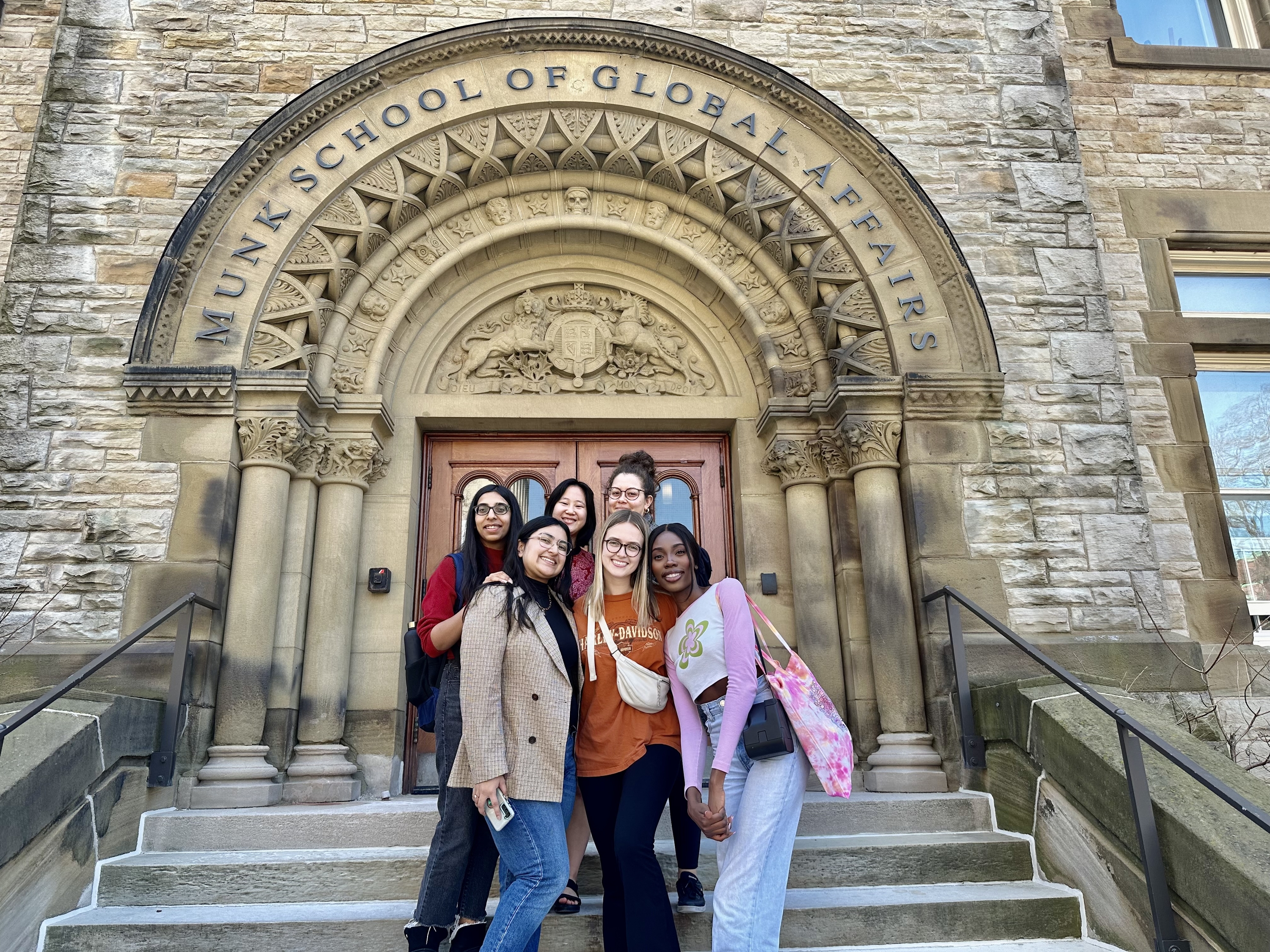 Hilda with friends outside of the Munk School. Photo courtesy of Hilida Idegwu.