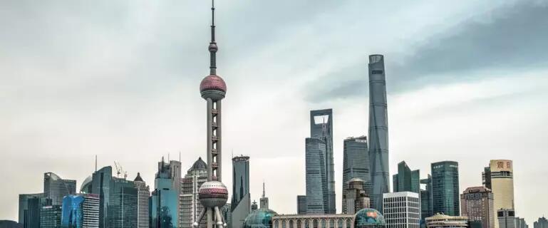 China skyline, featuring a tower and multiple highrise buildings