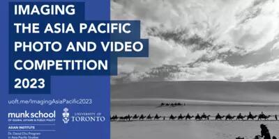 Imaging the Asia Pacific Photo and Video Competition 2023. Dr. David Chu program logo (with Asian Institute, Munk School, and U of T logos) and link to this webpage. Black and white image of the silhouettes of a line of camels carrying travellers across the desert. In the foreground right corner is one figure on a camel moving quickly. Photo by Photo by Ziyue Davia Dong, Way to Home.