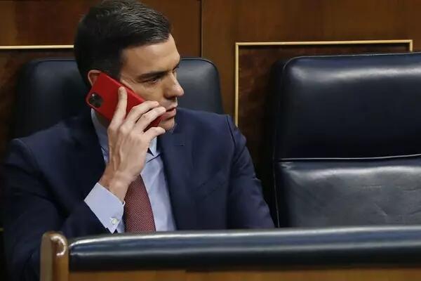 Spanish leader Pedro Sanchez talking on the phone