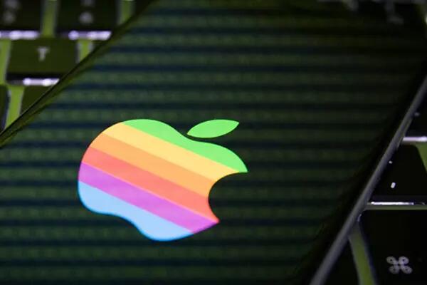 Rainbow colourful Apple logo reflected on a phone