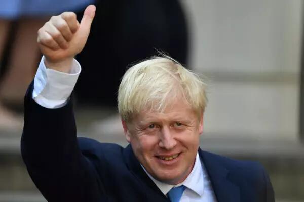 LONDON, ENGLAND - JULY 23: Newly elected leader of the Conservative party Boris Johnson gestures at Conservative party HQ in Westminster on July 23, 2019 in London, England. After a month of hustings, campaigning and televised debates the members of the UK's Conservative and Unionist Party have voted for Boris Johnson to be their new leader and the country's next Prime Minister, replacing Theresa May. (Photo by Jeff J Mitchell/Getty Images)