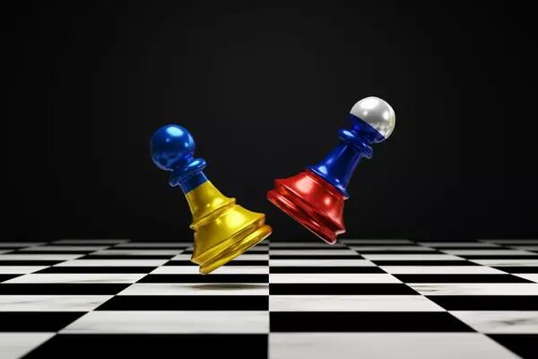 Russia and Ukraine flags as chess pieces