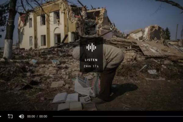 Screengrab of podcast screen showing an elderly woman from Bishiv village looks at books in front of a destroyed library on the outskirts of the city of Kyiv, Ukraine on March 25, 2022.