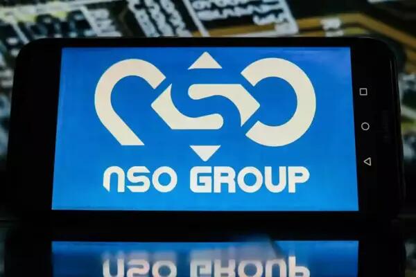 NSO Group logo on a blue screen displayed horizontally on a phone