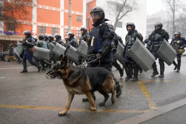 Riot police walk to block demonstrators gathering during a protest in Almaty, Kazakhstan, on Jan. 5, 2022. (Vladimir Tretyakov/AP)