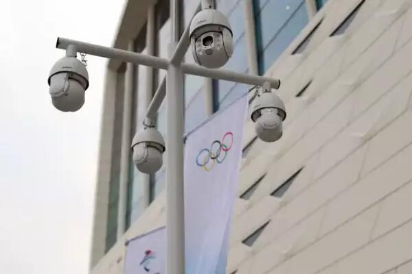 Security cameras outside the main media centre in Beijing. Photograph: Michael Heiman/Getty Images