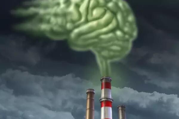 Image of a smoke stack with smoke coming out, in the shape of a brain to illustrate the damage that air pollution does to the brain