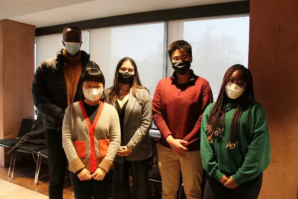 CSGJ students in seminar room wearing masks