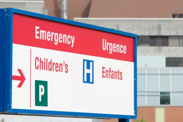 A sign directing visitors to the emergency department is shown at CHEO, Friday, May 15, 2015 in Ottawa.  ADRIAN WYLD / THE CANADIAN PRESS