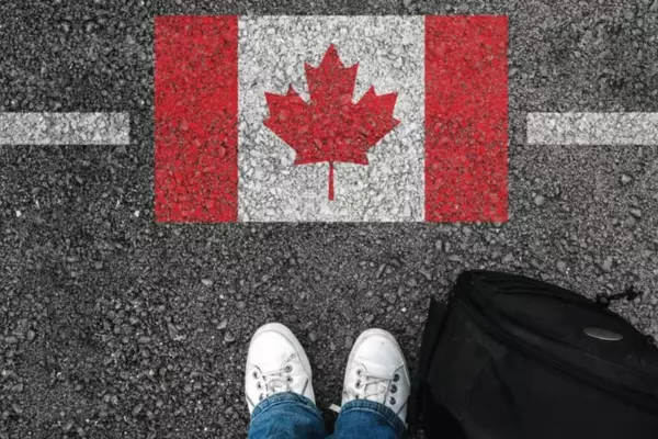 Canadian flag on asphalt 