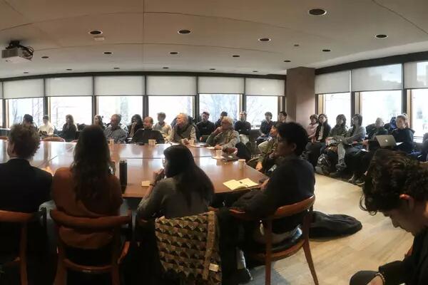 A picture of event attendees at a round table