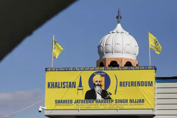 A banner with the image of Sikh leader Hardeep Singh Nijjar at the Guru Nanak Sikh Gurdwara temple, which was the site of his June 2023 killing, in Surrey, B.C., Sept. 20, 2023.