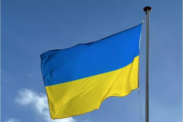 Ukraine flag on blue sky