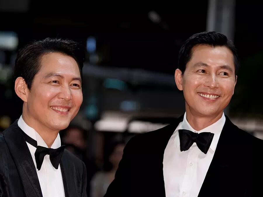 Lee Jung-jae and Jung Woo-sung attend the screening of "Hunt" during the 75th-annual Cannes Film Festival (photo by Joe Maher/Getty Images)