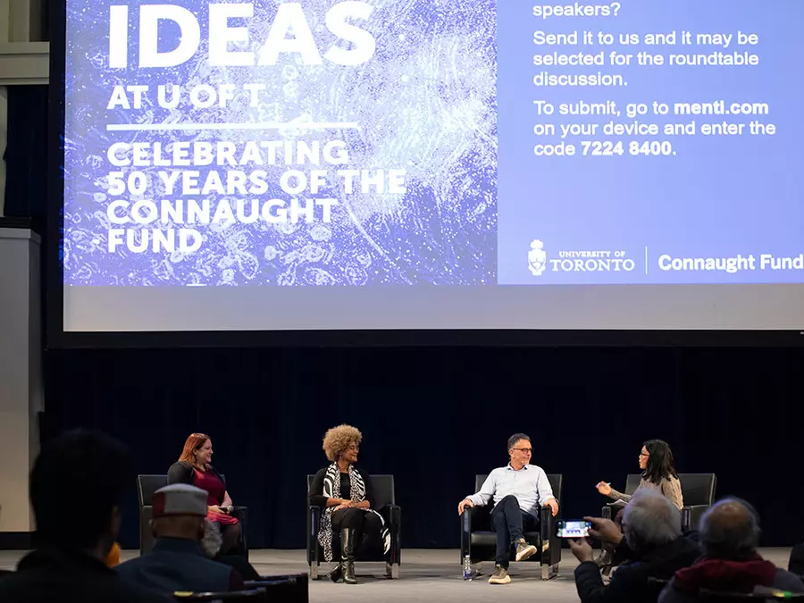 view of the stage during the roundtable: From left: Renée Hložek, Maydianne Andrade and Ronald Deibert discuss the importance of university research and the next big ideas to influence our society, with journalist Mary Ito (all photos by Polina Teif)