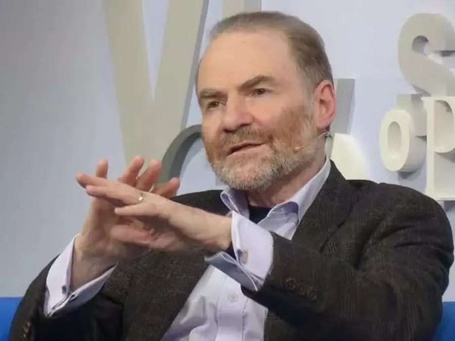 Timothy Garton Ash sits comfortably in a suit