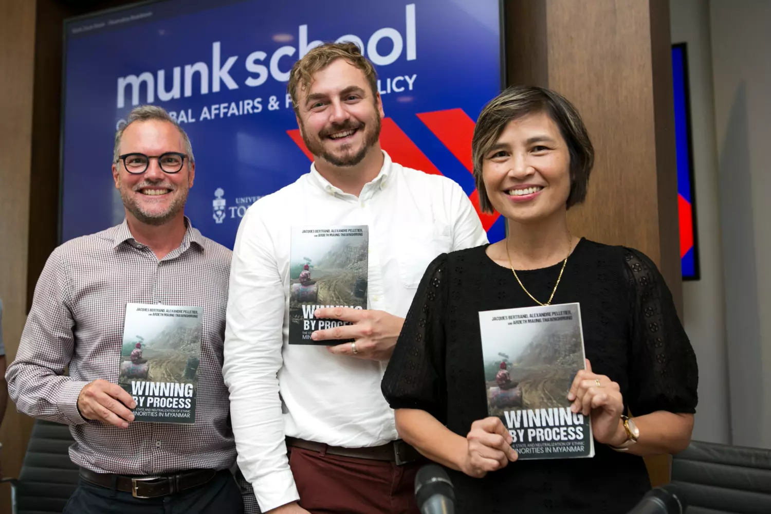 Co-authors of the Winning by Process on the day of the book launch at the Munk School