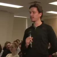 Université de Montréal student Vincent Perras asks a question
